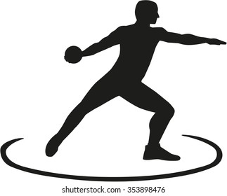 Discus thrower standing in the circle