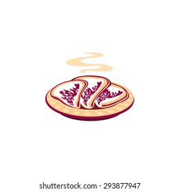 Dish of hot folded pancakes with smoke