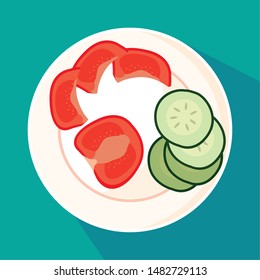 dish with slices of cucumber and tomatoes