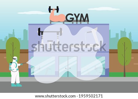 Disinfectant vector concept: Young man spraying disinfectant in the gym while wearing protective suit