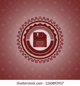 diskette icon inside badge with red background