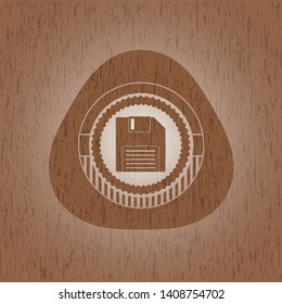 diskette icon inside badge with wooden background