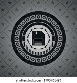 diskette icon inside black emblem. 