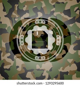 diskette icon inside camouflaged emblem