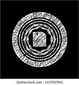 diskette icon inside chalkboard emblem on black board