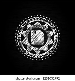 diskette icon inside chalkboard emblem