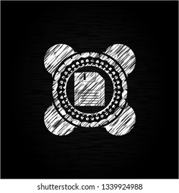 diskette icon inside chalkboard emblem on black board