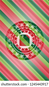 diskette icon inside christmas colors badge.
