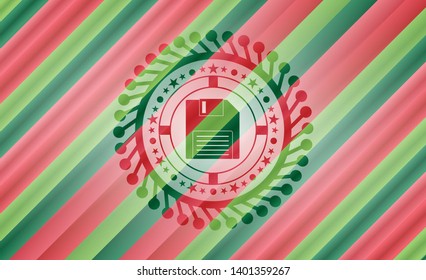 diskette icon inside christmas colors badge.