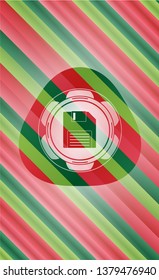 diskette icon inside christmas emblem.
