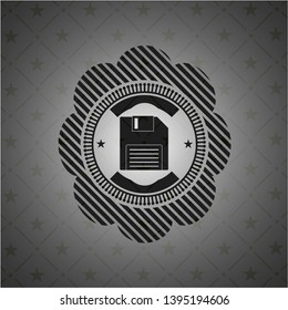 diskette icon inside dark badge or emblem