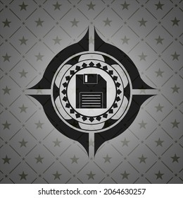 diskette icon inside dark emblem. 