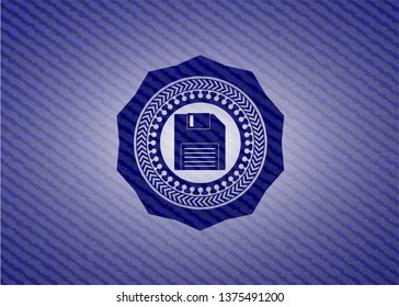 diskette icon inside denim background