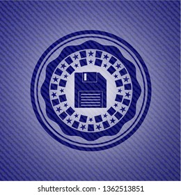 diskette icon inside emblem with jean texture