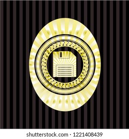 diskette icon inside gold badge