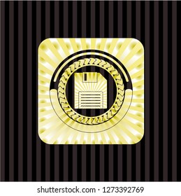 diskette icon inside gold shiny emblem