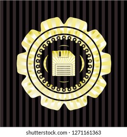 diskette icon inside golden emblem
