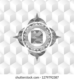diskette icon inside grey badge with geometric cube white background