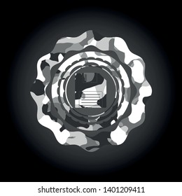 diskette icon inside grey camouflaged emblem