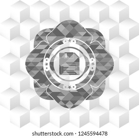 diskette icon inside grey emblem with geometric cube white background