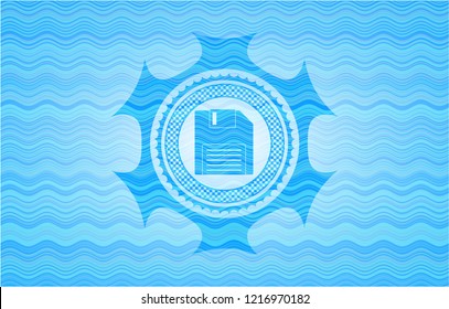 diskette icon inside light blue water wave emblem background.
