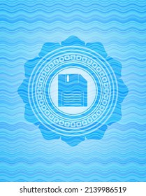 diskette icon inside light blue water wave style badge. 