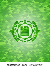 diskette icon inside realistic green emblem. Mosaic background
