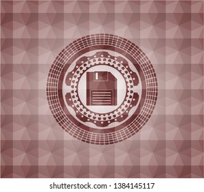diskette icon inside red seamless badge with geometric pattern background.