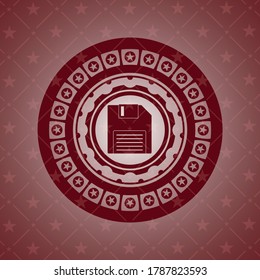diskette icon inside retro red emblem. 