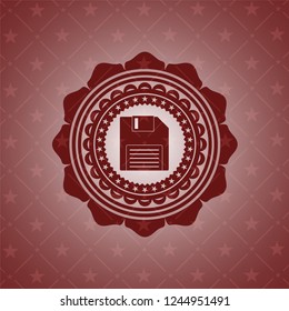 diskette icon inside retro style red emblem