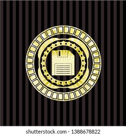 diskette icon inside shiny emblem