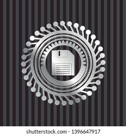 diskette icon inside silver emblem or badge