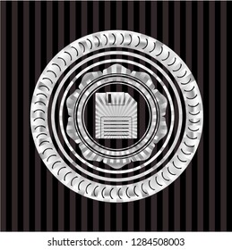 diskette icon inside silver shiny emblem