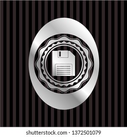diskette icon inside silver shiny emblem