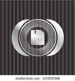 diskette icon inside silvery emblem or badge