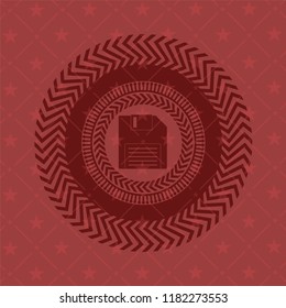 diskette icon inside vintage red emblem