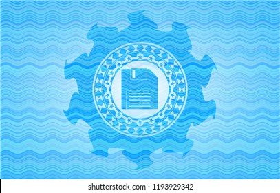 diskette icon inside water representation style emblem.