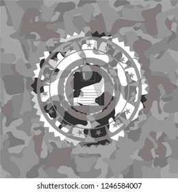 diskette icon on grey camouflage texture