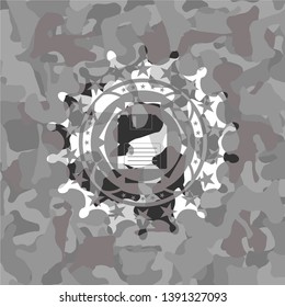 diskette icon on grey camouflage texture
