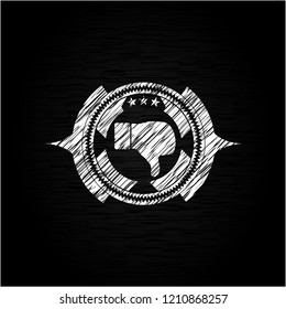 dislike icon inside chalk emblem written on a blackboard
