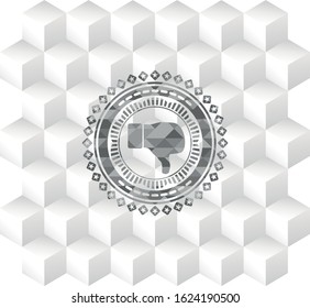 dislike icon inside grey emblem with geometric cube white background