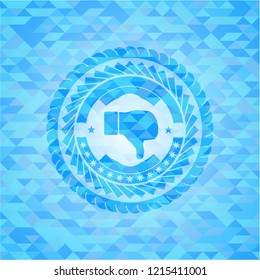 dislike icon inside light blue emblem with triangle mosaic background