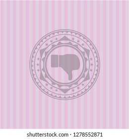 dislike icon inside pink emblem