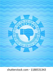 dislike icon inside sky blue water wave style badge.