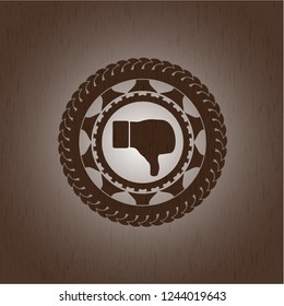 dislike icon inside wooden emblem