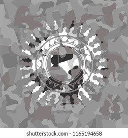 dislike icon on grey camo texture
