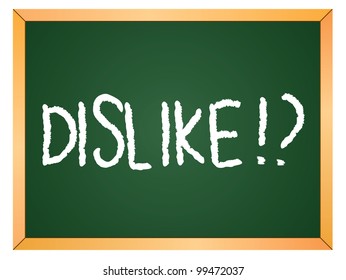 "dislike" word written on chalkboard