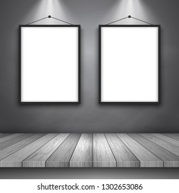 Display background with wooden table and blank picture frames