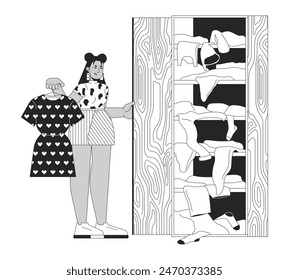 Displeased woman at wardrobe black and white cartoon flat illustration. Female near full closet cartoon outline character isolated on white. Overconsumption monochrome scene vector outline image