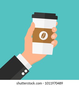 Disposable Coffee Cup In Hand. Flat Design Illustration